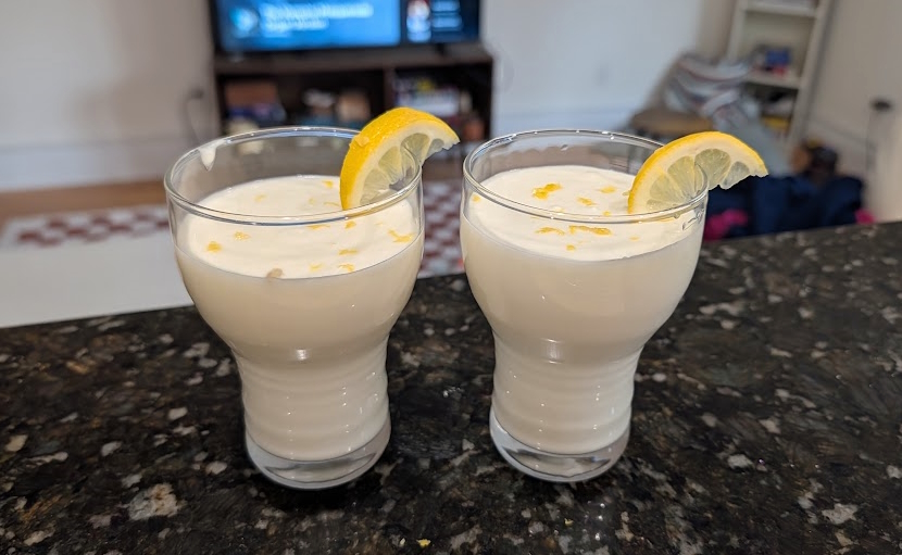 two glasses of syllabub lined up